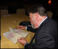 Ernie Fretter With Joe Plemons Grade Book
